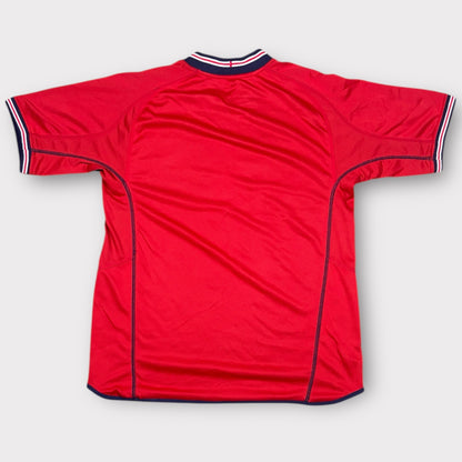 Red sports jersey with white and navy accents on a light gray background